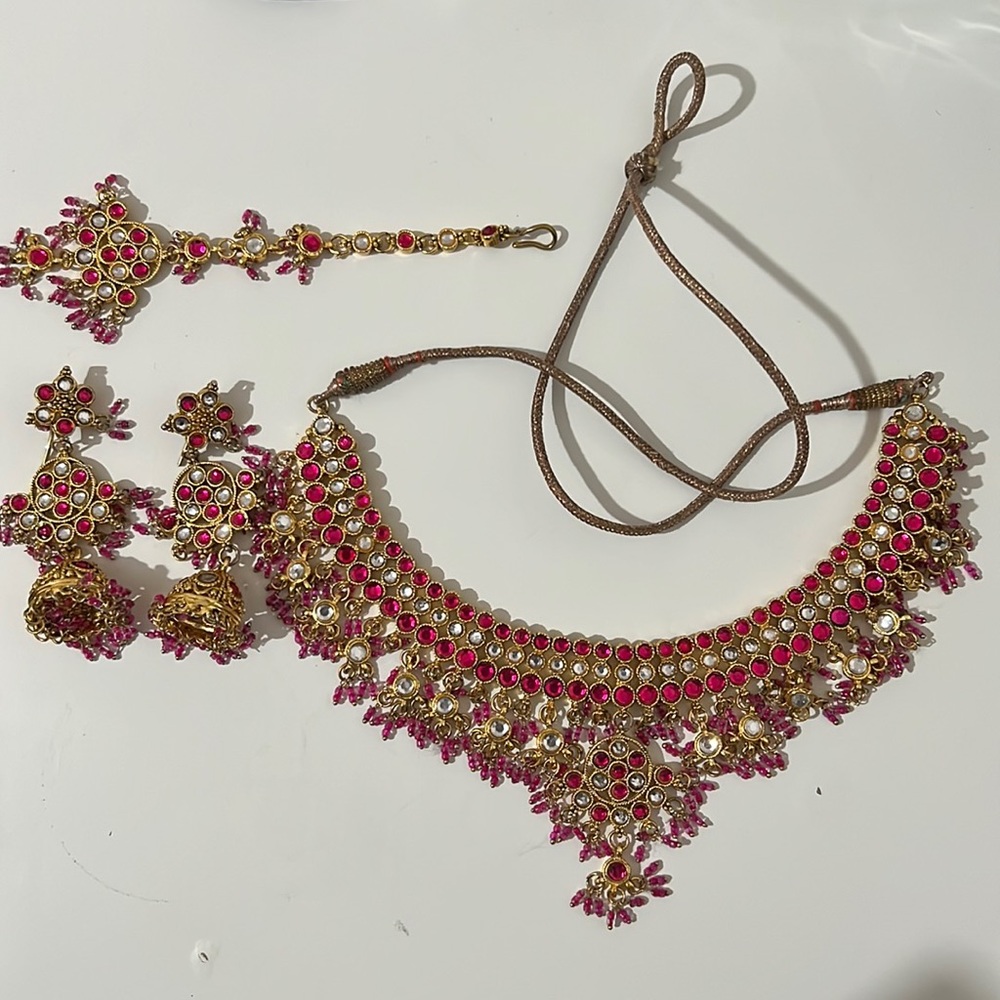 Pink and gold stone earrings, necklace and tikka (headpiece) set